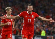 爱游戏公司-威尔士队球员在国际赛事中展现出强大实力，引发热议的简单介绍